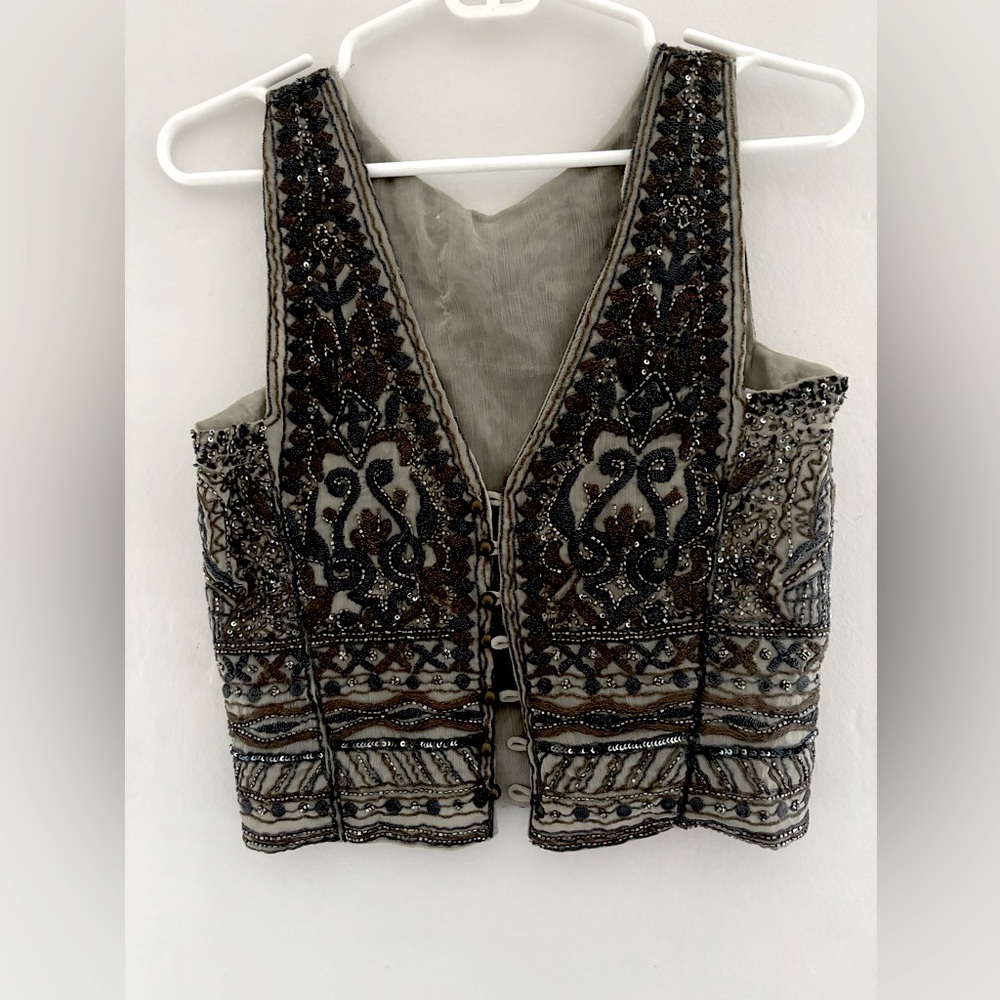 The cutest Vintage 70’s vest that was also worn on the show “Daisy and the Six”